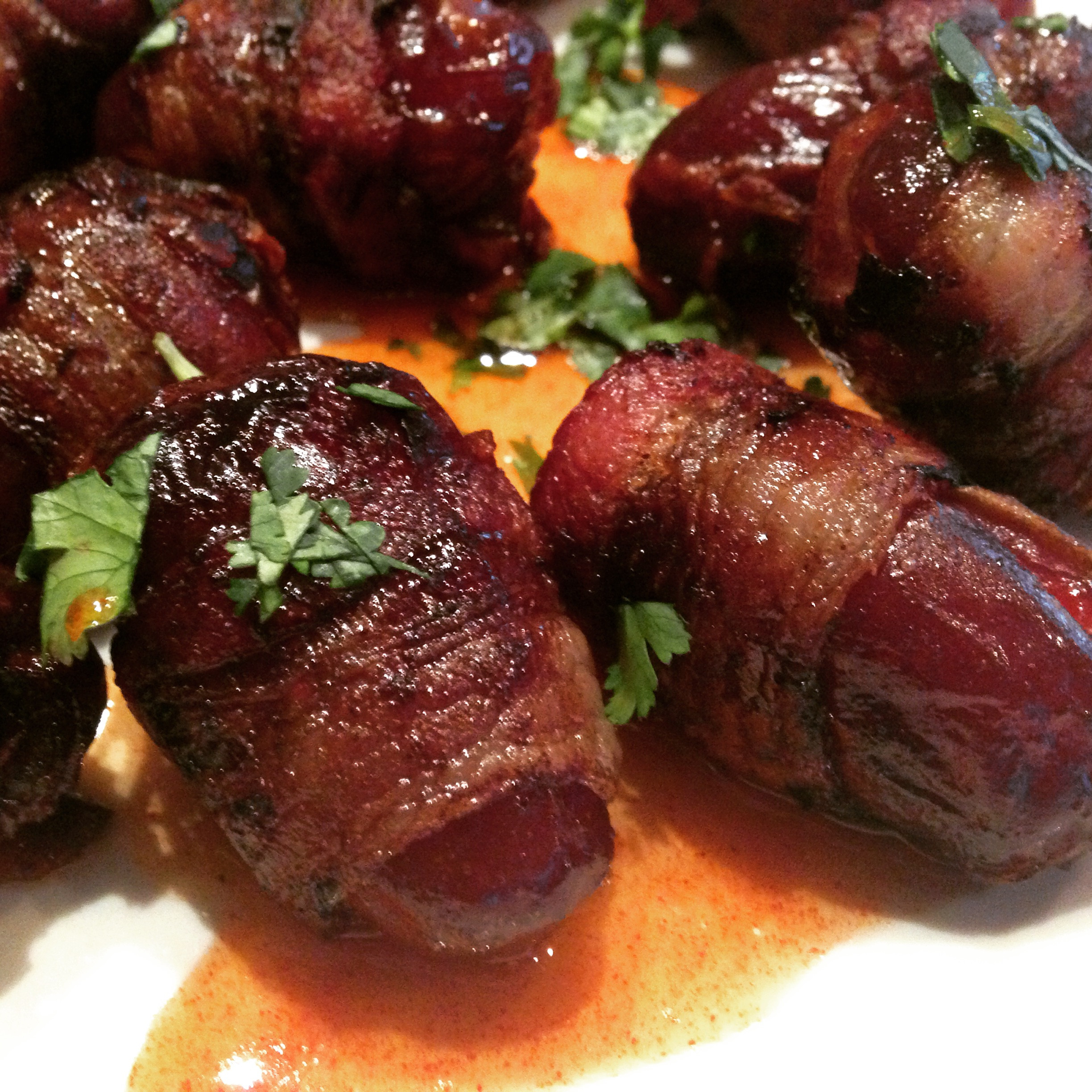 Bacon Date Appetizers
 Bacon Wrapped Dates with Spiced Honey What s Parker s