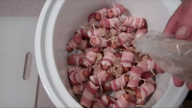 Bacon Wrapped Hot Dog Appetizers
 Bacon wrapped mini hot dogs with this in the slow cooker