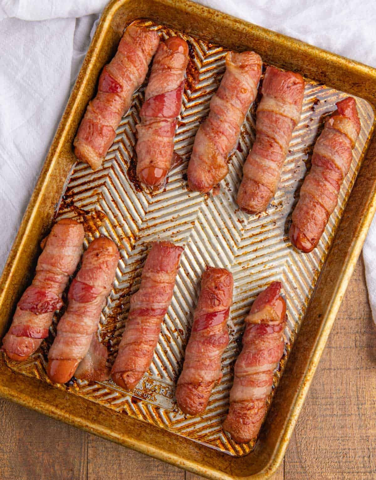 Bacon Wrapped Hot Dog Appetizers
 Baked hot dogs make the ultimate classic summer meal