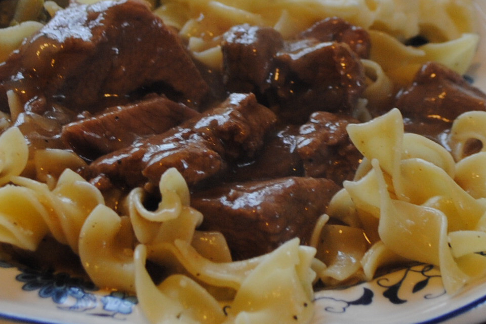 Beef Tips And Noodles
 OLD TIME BEEF TIPS AND GRAVY OVER BUTTERED SEASONED NOODLES