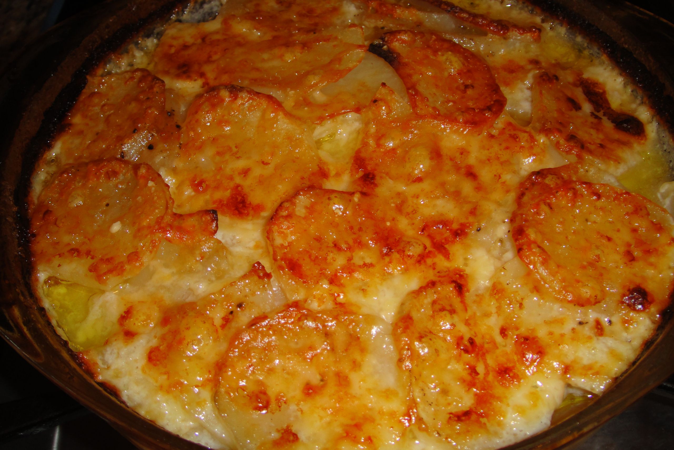 Cheese Scalloped Potatoes
 Scalloped Potatoes with Three Cheeses