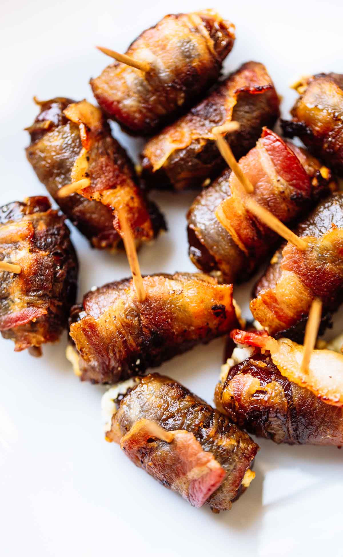 Easy Bacon Recipes Appetizers
 Bacon Wrapped Dates with Goat Cheese Recipe Pinch of Yum