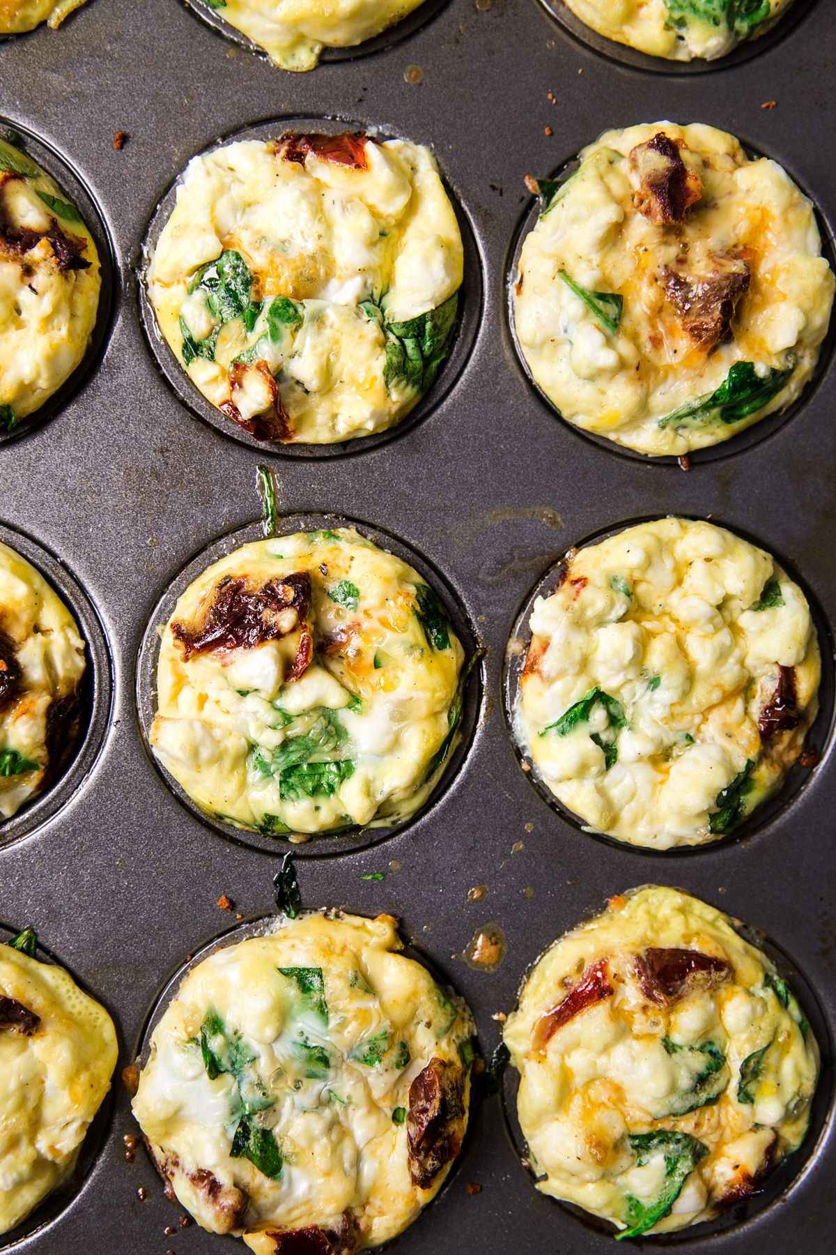 Healthy Breakfast Egg Muffins With Spinach
 Feta Spinach Breakfast Egg Muffins with Sun Dried Tomatoes