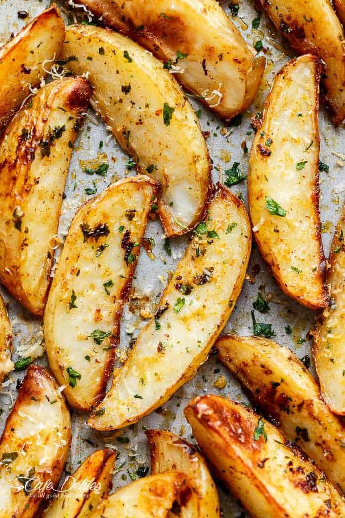 Potato Wedges In Oven
 Crispy Garlic Baked Potato Wedges Cafe Delites