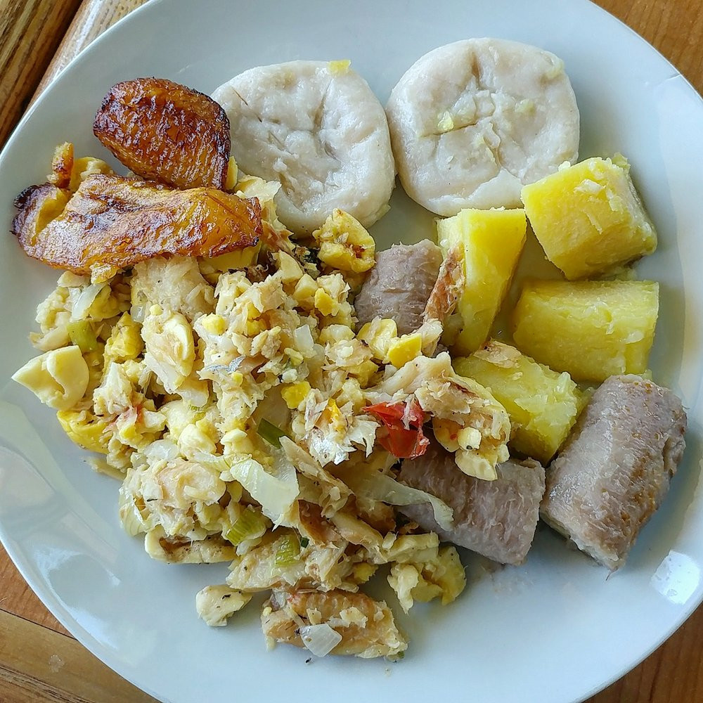 Saltfish And Dumplings
 Ackee and Saltfish Plate dumplings and provisions picked