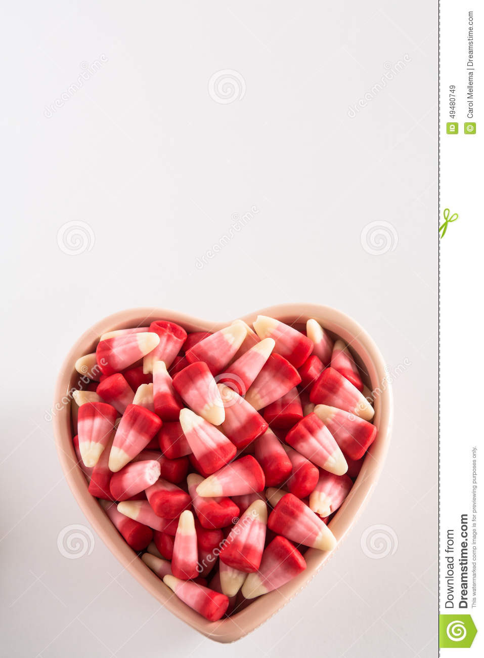 Valentines Day Candy Corn
 Valentines Day Candy Corn In Heart Shaped Bowl Stock
